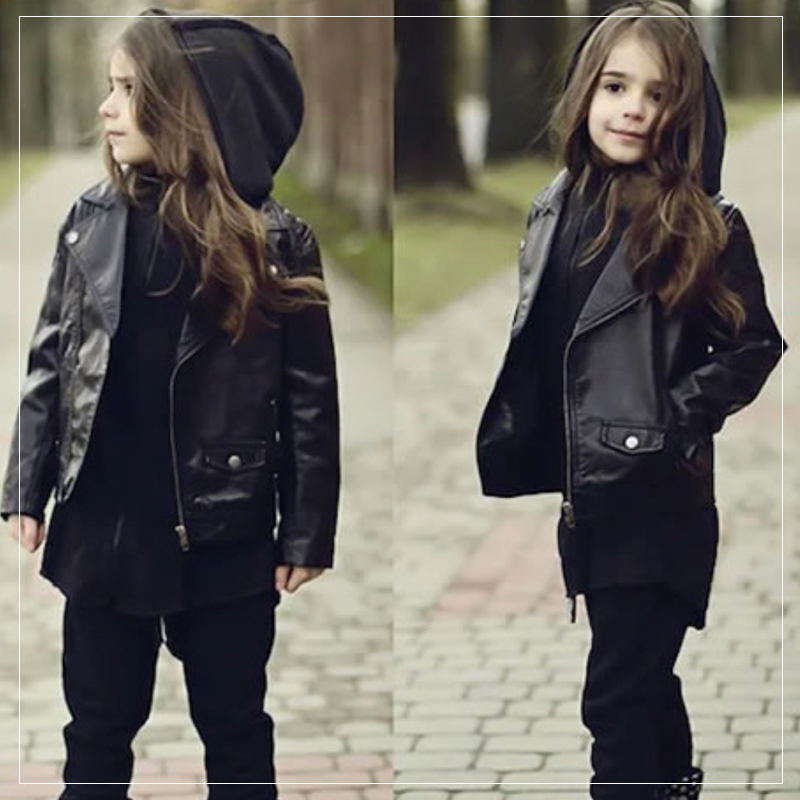Child wearing leather jacket