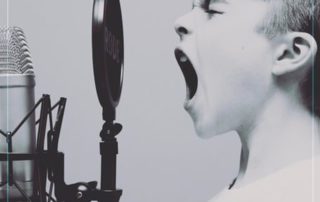 Child Speaking to a Mic